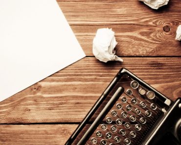 Cropped typewriter at desk